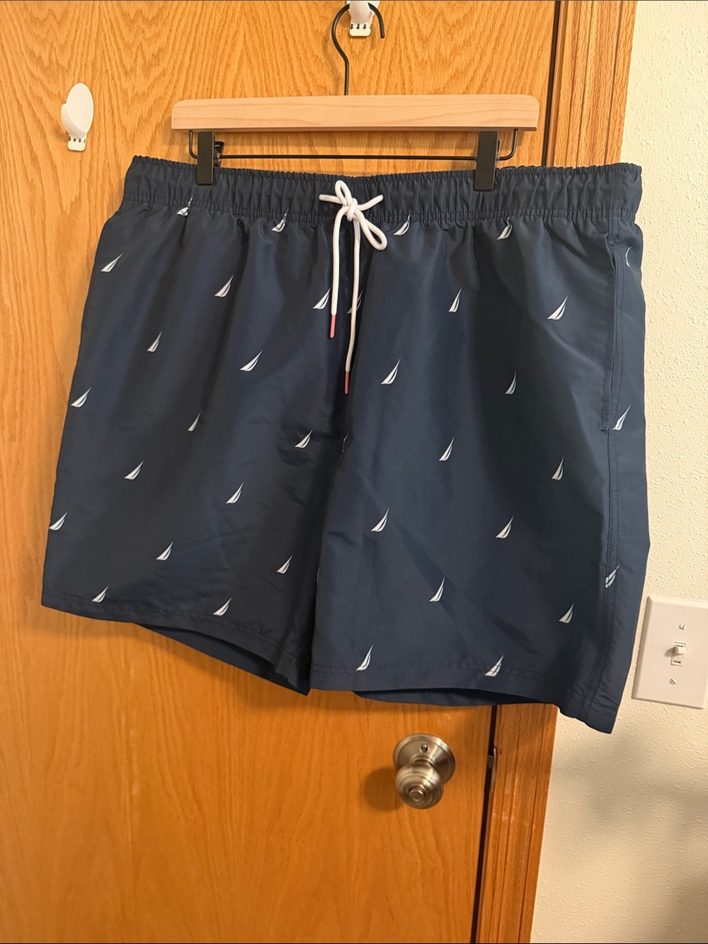 Nautica Navy Swim Trunks with White Sailboat Motif